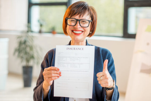 woman holding document